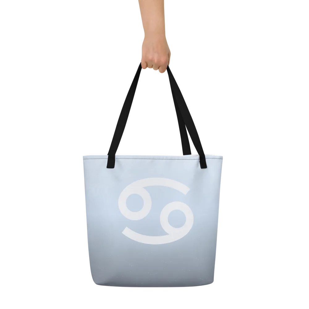Cancer Zodiac Tote in Ice Blue held in hand