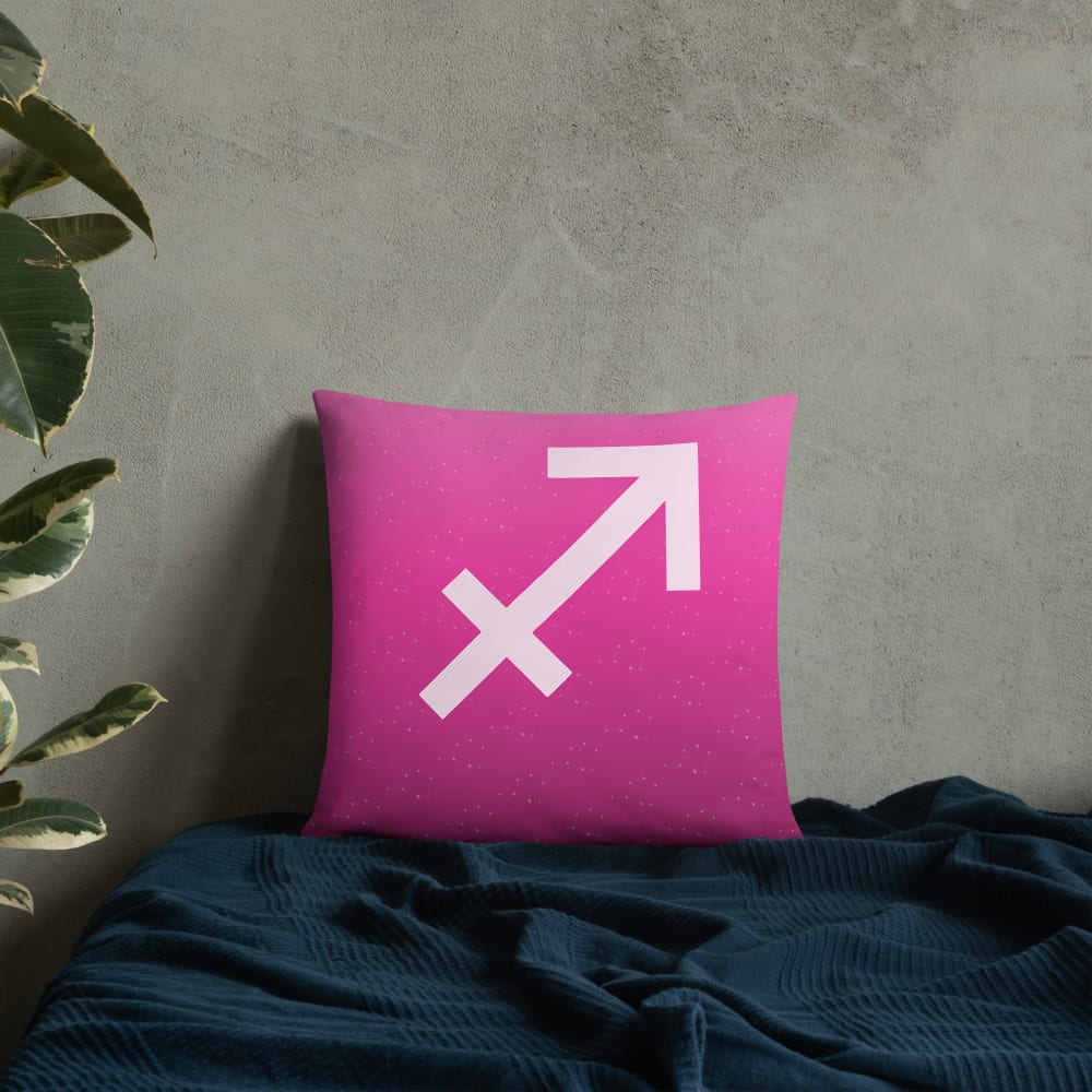 Sagittarius Zodiac Pillow in Fuchsia in a lifestyle setting