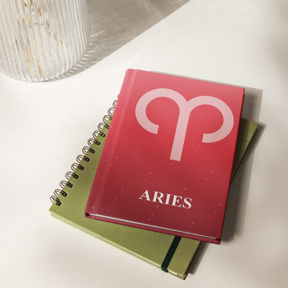 Aries Zodiac Journal in Poppy in a lifestyle setting