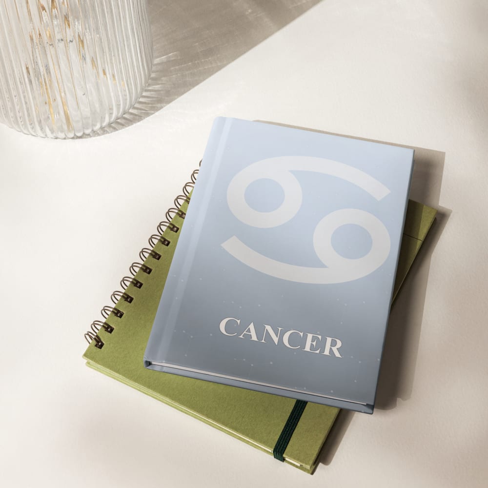 Cancer Zodiac Journal in Ice Blue in a lifestyle setting