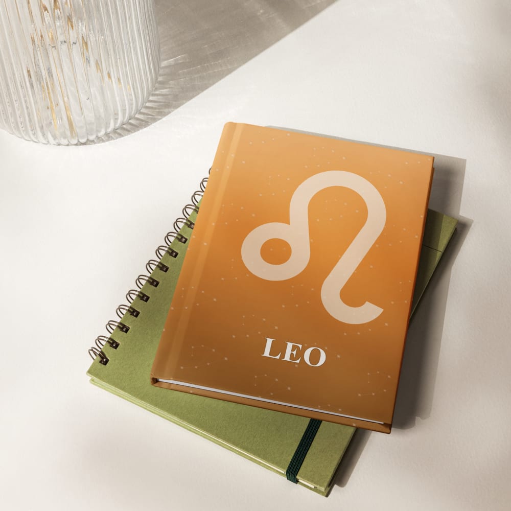 Leo Zodiac Journal in Tangerine in a lifestyle setting